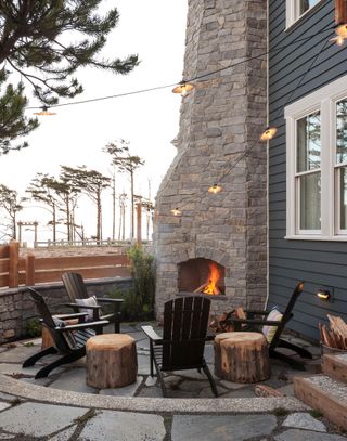 Stone fireplace on rustic patio