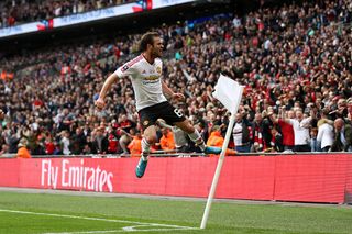 Juan Mata of Manchester United celebrates as he scores their first goal during The Emirates FA Cup Final match between Manchester United and Crystal Palace at Wembley Stadium on May 21, 2016 in London, England. (Photo by Paul Gilham/Getty Images)