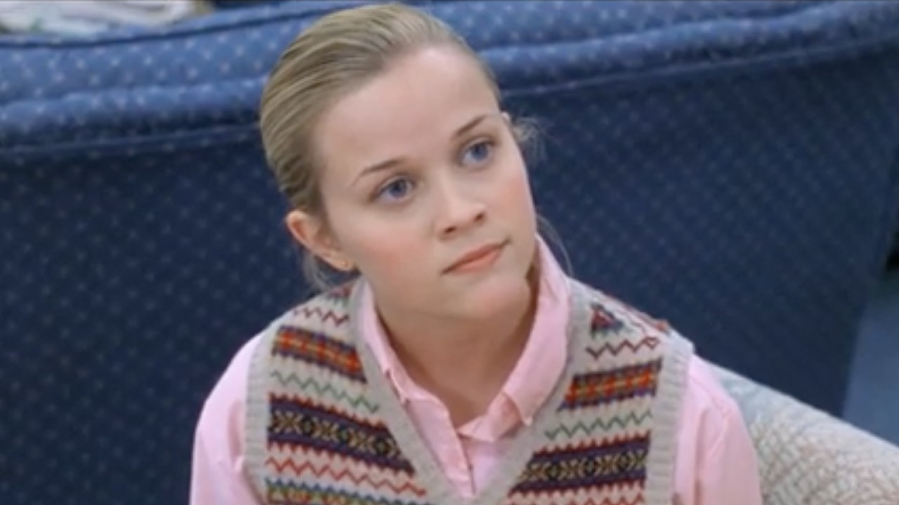 Reese Witherspoon as Tracy flick in Election looking mad and clenching her jaw.