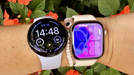 the Google Pixel Watch 4 and Apple Watch 11 on the wrist 