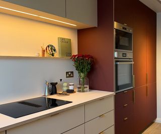 A white and burgunday ikea kitchen with custom doors from Plykea