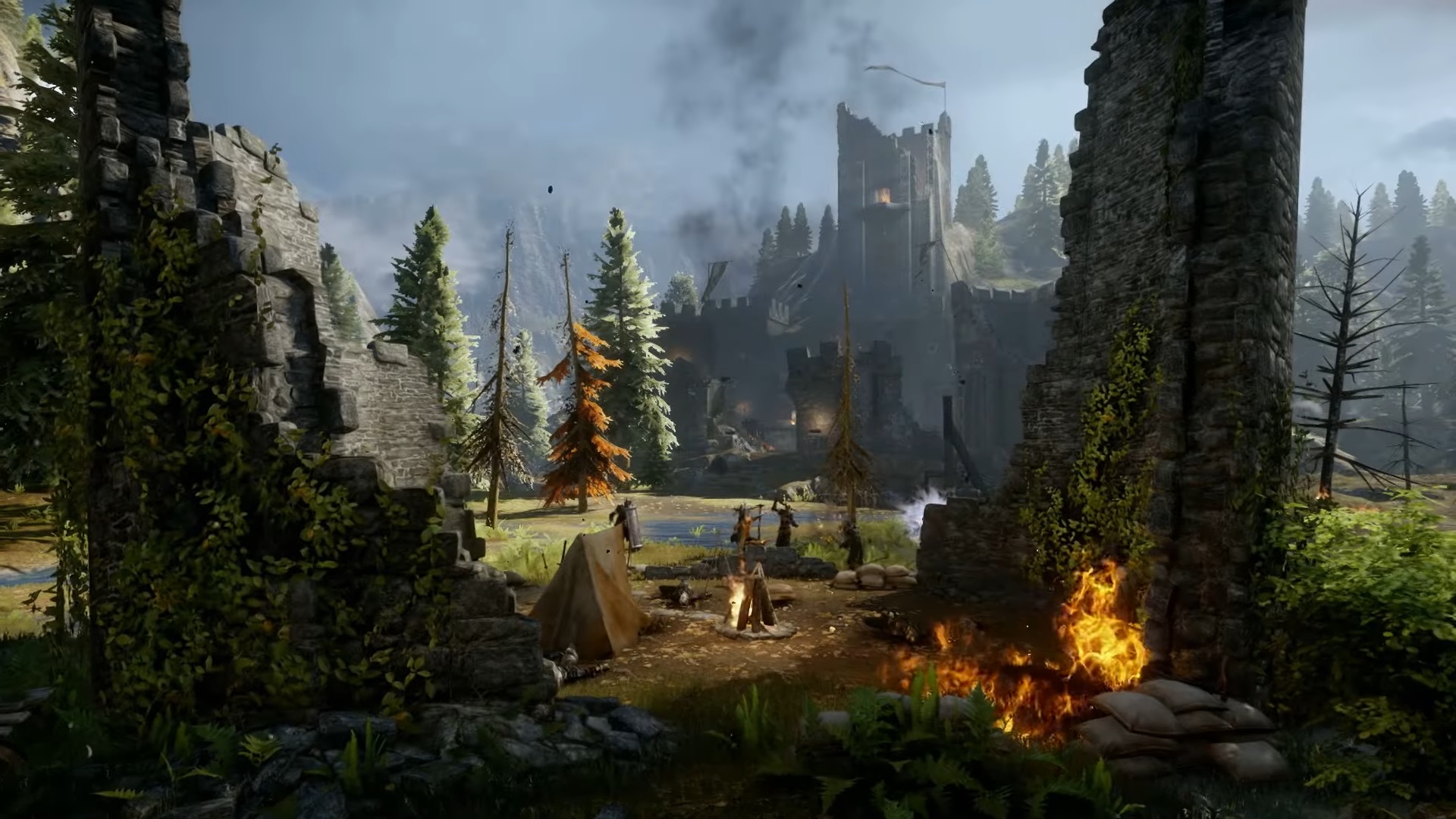 Panoramic view of bucolic Hinterlands area of Dragon Age: Inquisition, with ruined castle visible in background and campsite visible in foreground.