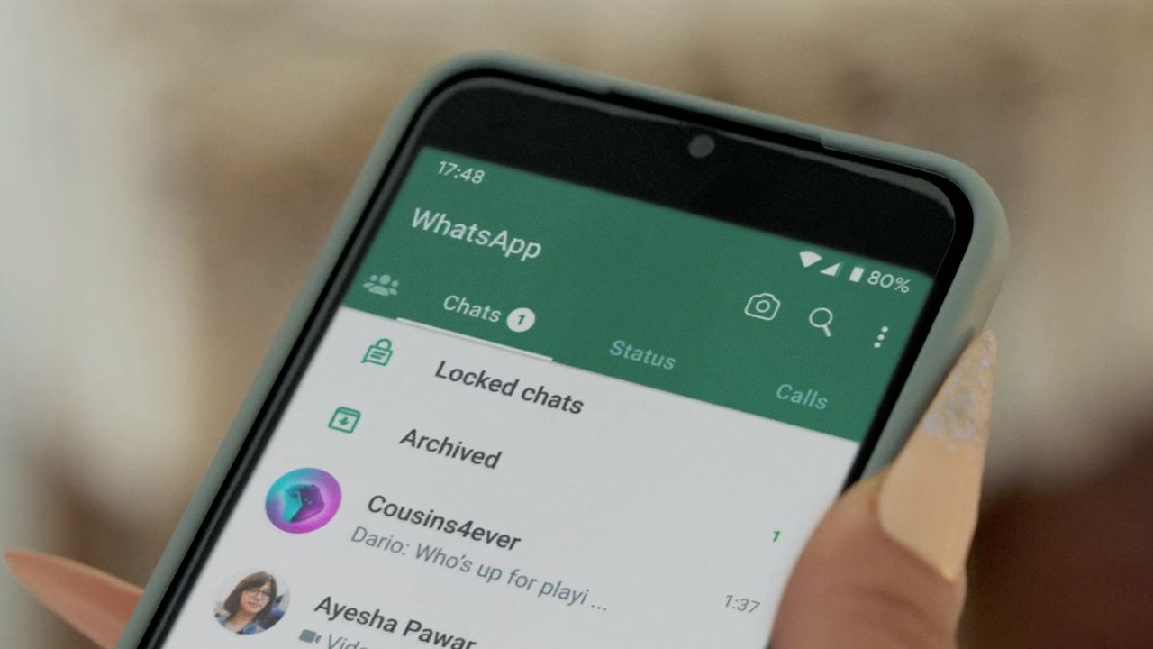 The WhatsApp Chat Lock feature shown in use