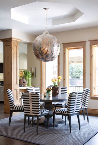 A dining room with a circular table