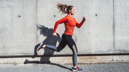 What to eat after a run: woman running through the street