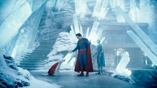 David Corenswet as Superman with Krypto the dog and a robot in the Fortress of Solitude.