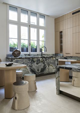 A kitchen with reconfigured light and open layout