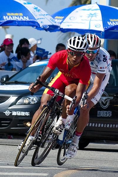 Two riders tried to sneak away from the peloton early into the six lap street circuit race around Sanya.