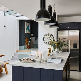 kitchen with wall watch and candle