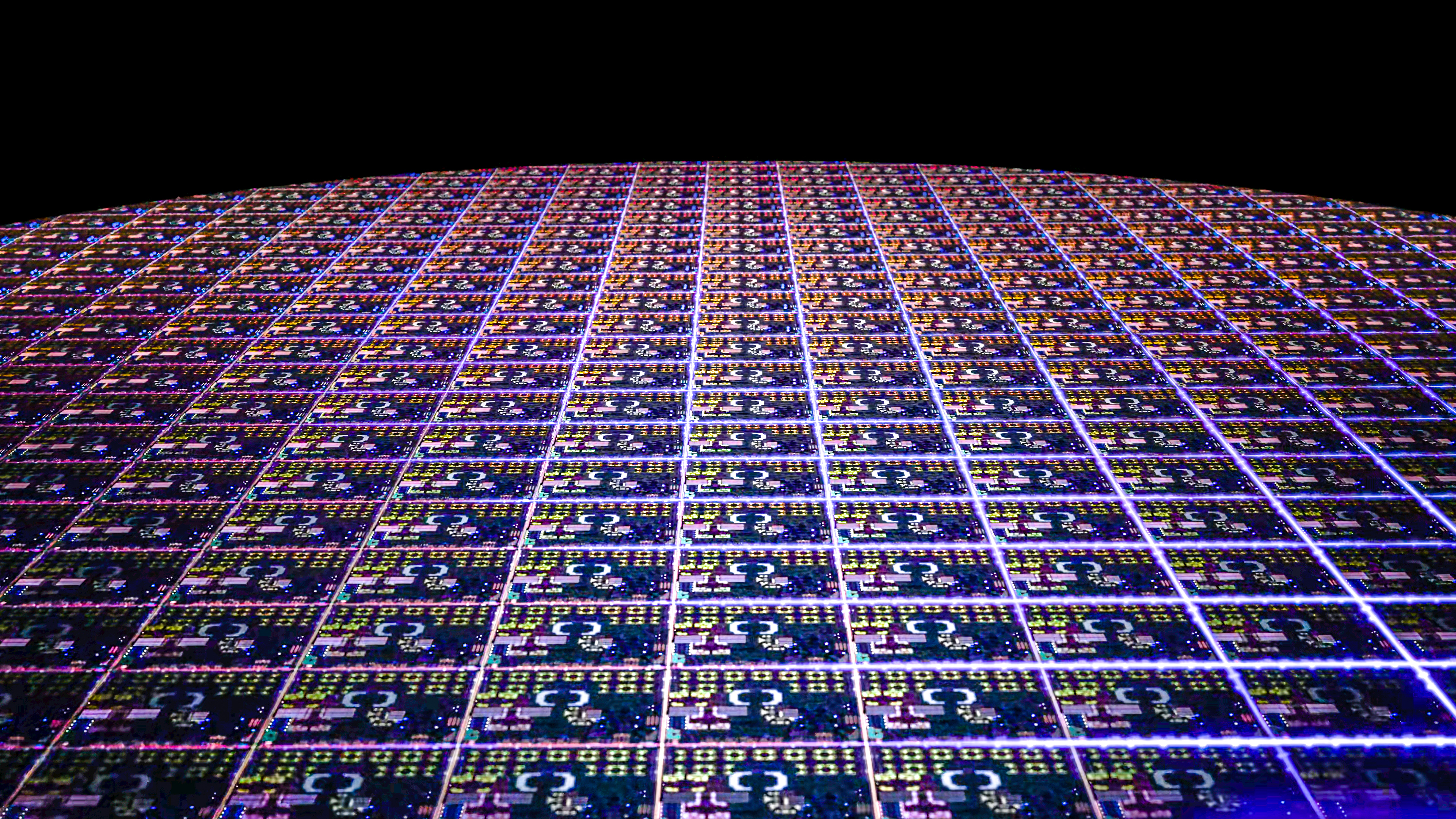 Graphic of a wafer of Apple M2 chips seen from above
