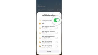 How to enable Adaptive Lighting with your HomeKit-enabled lights in the Home app on the iPhone by showing steps: Tap Enable Adaptive Lighting.