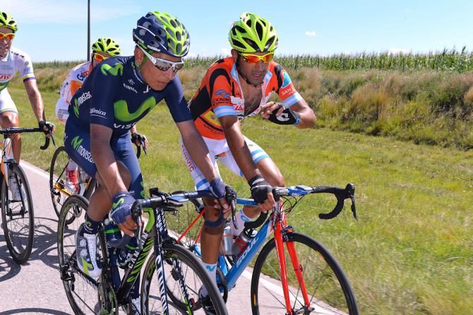 Daniel Diaz chats with Nairo Quintana before the race heats up.