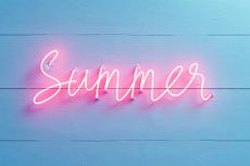 pink neon sign spelling out summer