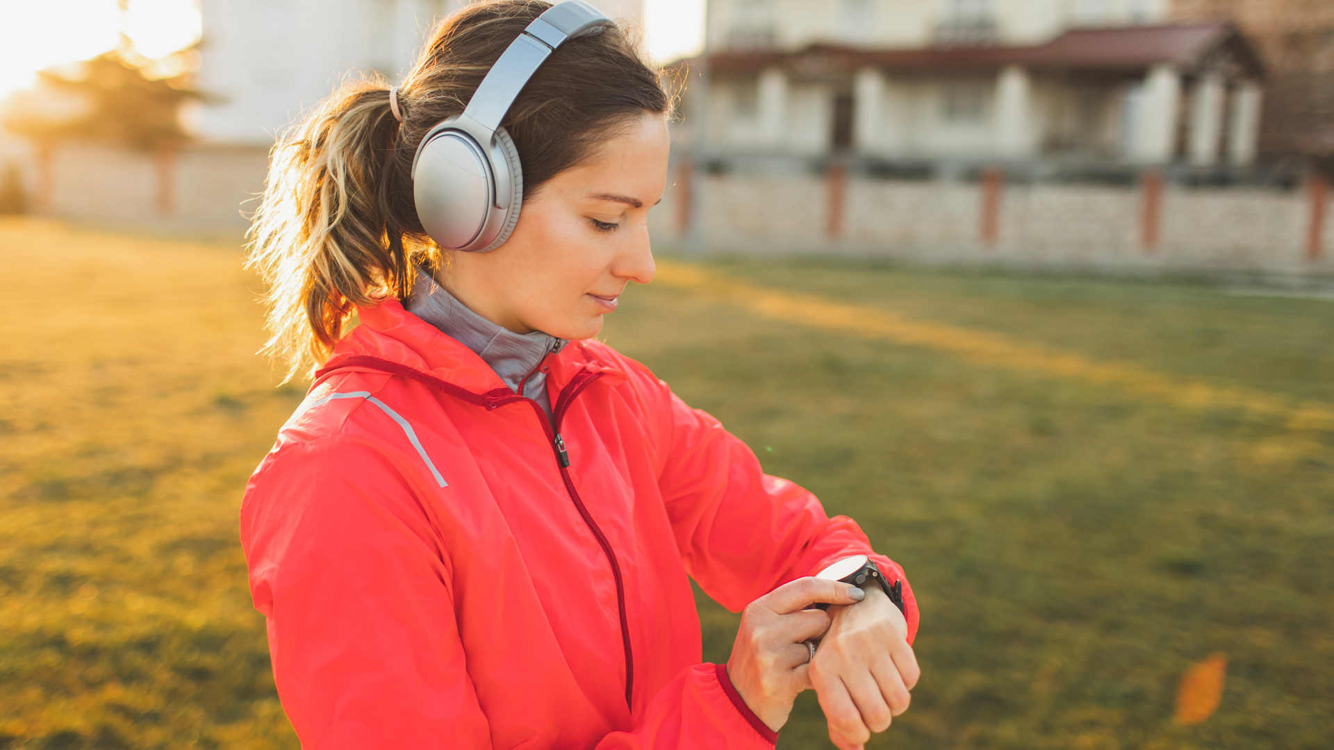 Image of woman using fitness tracker on a run