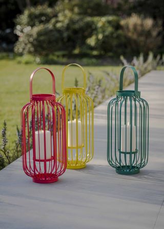 trio of colourful outdoor lanterns