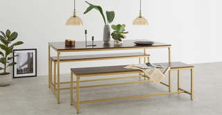 dining table with sleek minimalist feel and benches by made.com
