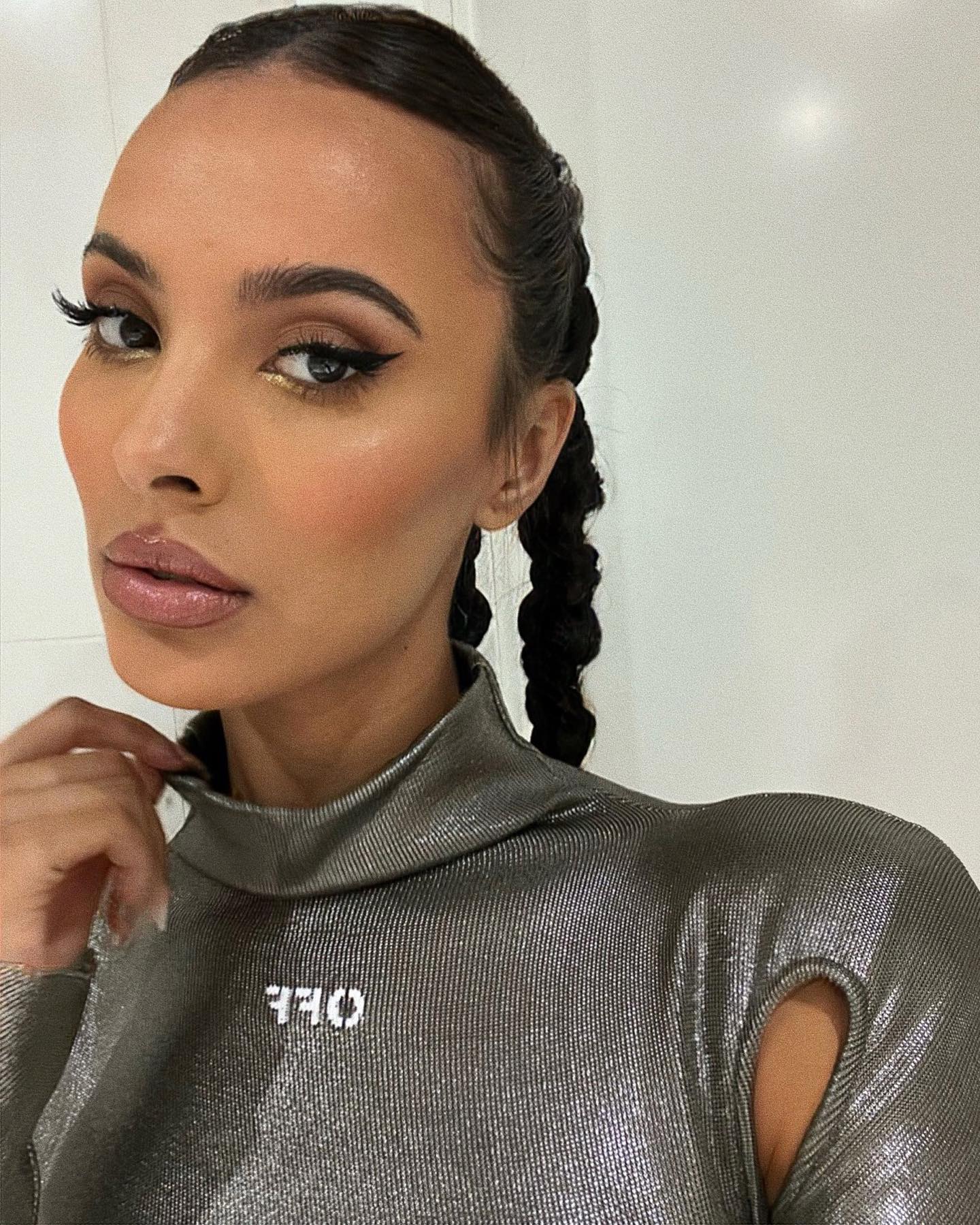 Maya Jama wearing braided ponytail twisted hairstyles