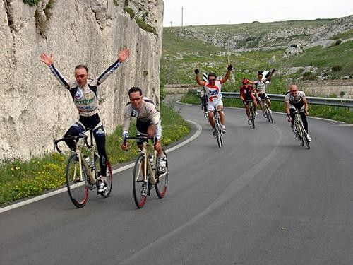Italian riders don't quite have "the wave" down yet.