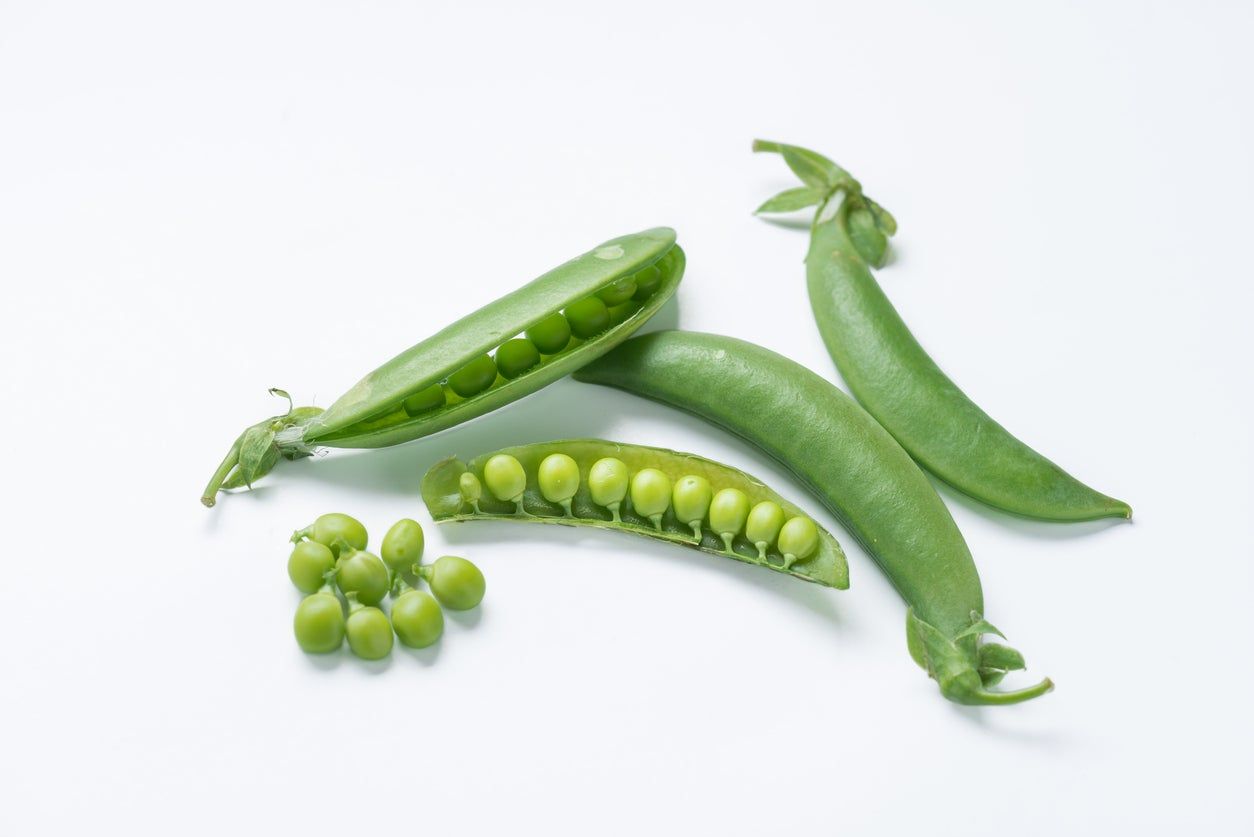 Whole Split Open And Seeds Of Sugar Peas