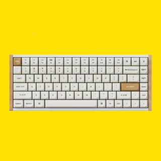 Keychron K2 HE gaming keyboard on a yellow background