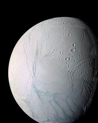 Image of Saturn's moon Enceladus, showing the "tiger stripes," long fractures from which the water vapor jets are emitted.