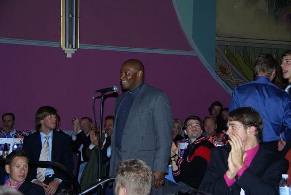 Olympic silver medalist Nelson Vails poses a question to the team.