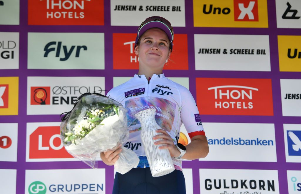 NOREFJELL NORWAY AUGUST 13 Neve Bradbury of Australia and Team CanyonSRAM Racing celebrates at podium as White Best Young Jersey winner during the 8th Tour of Scandinavia 2022 Battle Of The North Stage 5 a 1274km stage from Vikersund to Norefjell 791m UCIWWT tourofscandinavia TOSC22 on August 13 2022 in Norefjell Norway Photo by Luc ClaessenGetty Images