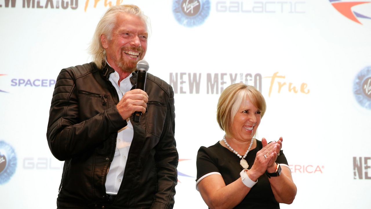 Virgin Galactic founder Sir Richard Branson and New Mexico Governor Michelle Lujan Grisham at the opening of the Gateway to Space terminal at Spaceport America near Truth or Consequences, New Mexico on Aug. 15, 2019.
