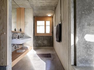 Bathroom of concrete apartment in Zurich