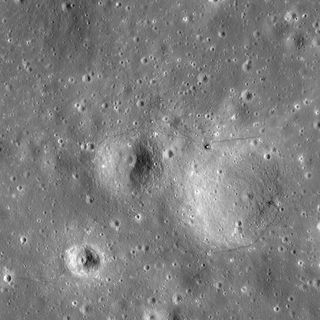 The Apollo 12 landing site in Oceanus Procellarum, now known as Statio Cognitum. Here, you can see the remnants of not one, but two missions to the Moon. Astronauts Pete Conrad and Alan Bean demonstrated that a precision lunar landing with the Apollo system was possible, enabling all of the targeted landings that followed. Bean and Conrad collected rock samples and made field observations, which resulted in key discoveries about lunar geology. They also collected and returned components from the nearby Surveyor 3 spacecraft, which landed at this site almost two and half years before Apollo 12.