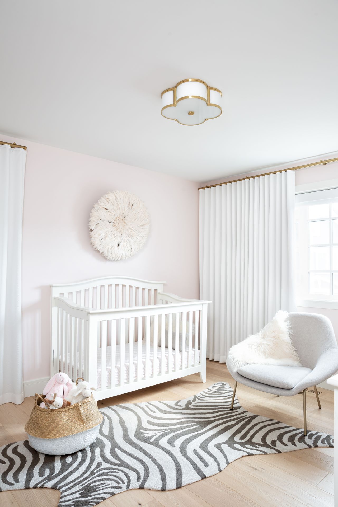 A leopard print rug in a kids bedroom