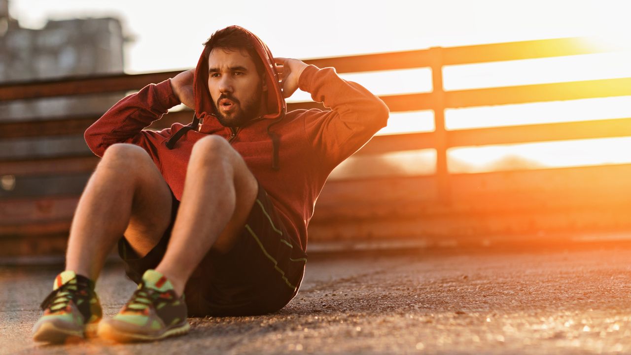 Man workouts outside