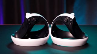 PSVR 2 Review Image showing the VR2 Sense controllers sitting on a desk