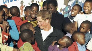 Prince Harry with children in Africa, 2006