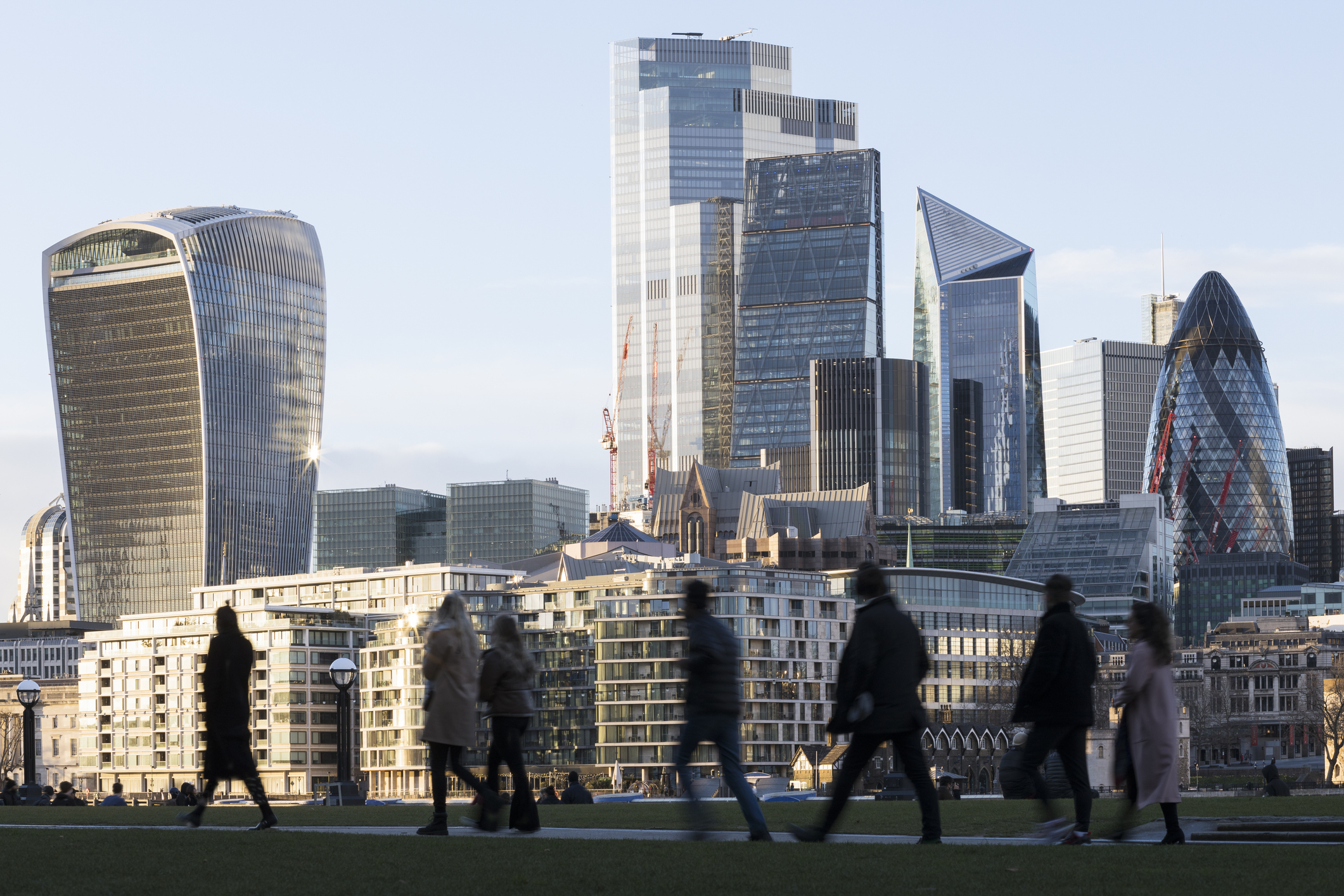 City workers against London skyline