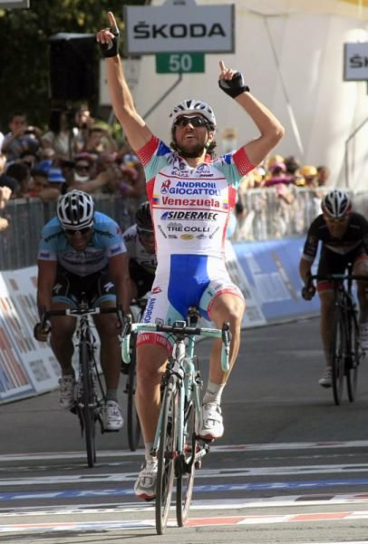 Italy's Roberto Ferrari (Androni Giocattoli) made it safely through the final turn in front of the crash and sprinted to victory.