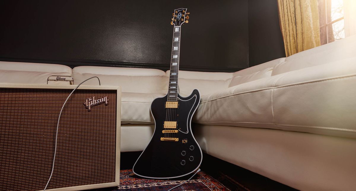 Gibson RD Custom: the cult-classic electric guitar returns in an Ebony finish, with the full Custom aesthetic of block inlays on an ebony fingerboard, multi-ply binding, and gold hardware and pickup coverings.