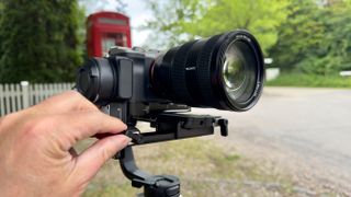 Zhiyun Cinepeer Weebill 3E gimbal close up being operated by a person's hand