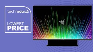 A razer monitor against a purple TechRadar Black Friday monitor deal background