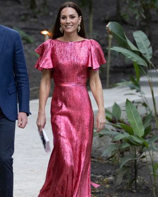 Kate Middleton wearing a maxi pink glittery dress with short sleeves