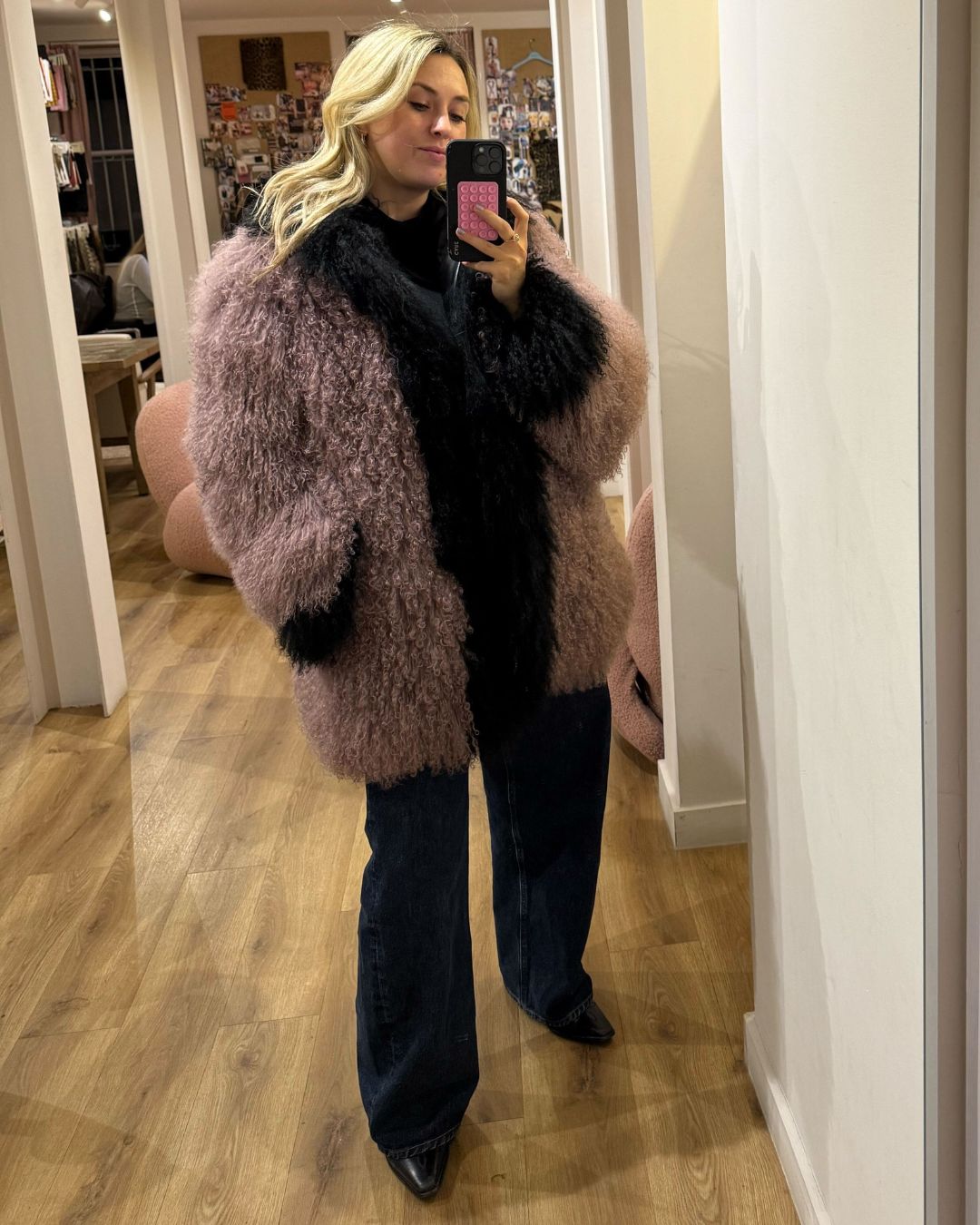 clementina jackson tries on a pink fluffy charlotte simone coat