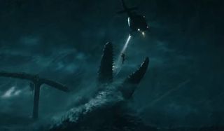Jurassic World: Fallen Kingdom Mosasaurus chases the chopper with chompers