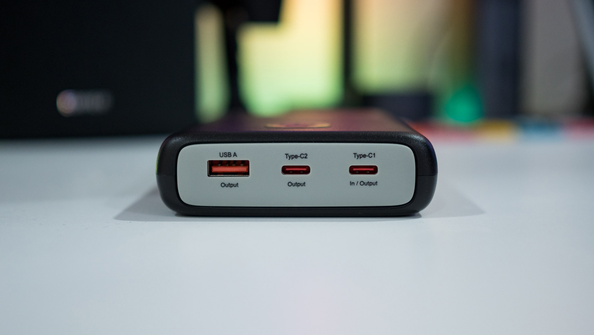 Side view of Stuffcool 85W Power Bank showing three USB ports
