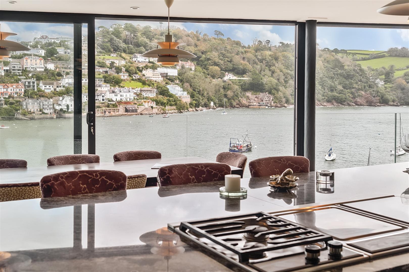 A kitchen with views of the River Dart.