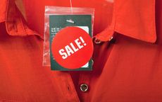 Sale tag on red blouse