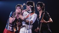 Mick Jagger, Ron Wood, and Keith Richards onstage in 1987