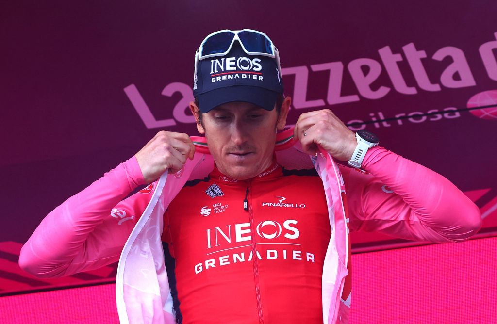 INEOS Grenadierss British rider Geraint Thomas wears the overall leaders pink jersey on the podium after the sixteenth stage of the Giro dItalia 2023 cycling race 203 km between Sabbio Chiese and Monte Bondone near Cavedine on May 23 2023 Photo by Luca Bettini AFP Photo by LUCA BETTINIAFP via Getty Images