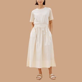 Flat lay of woman wearing white dress