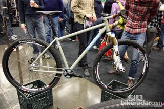 Soulcraft's Holy Roller singlespeed in flat grey with a 44mm head tube, rocker dropouts, and a PressFit 30 bottom bracket.