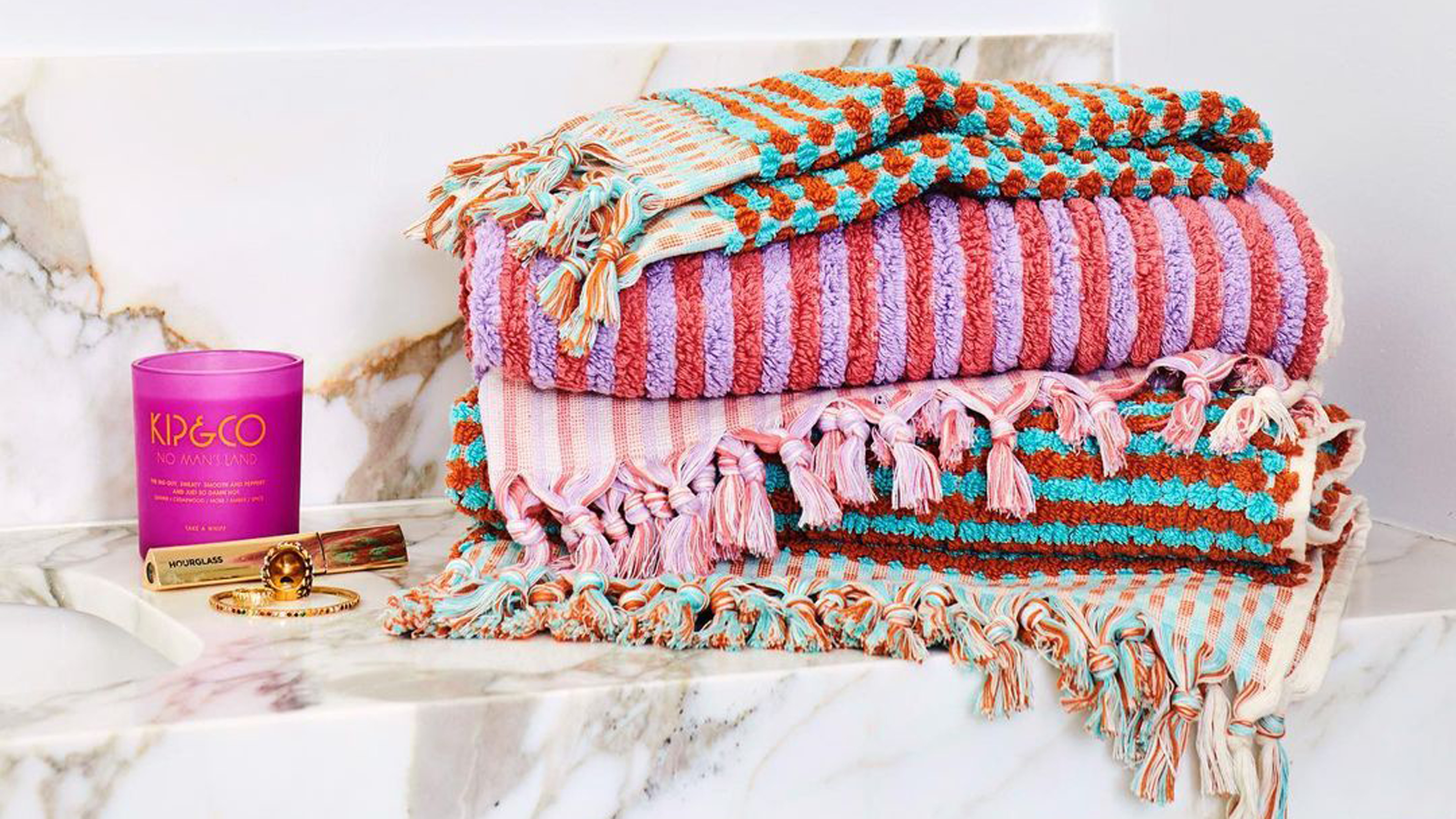 9 Clever Ways to Organize With a Towel Bar